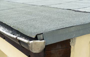 repair or replace Poniou flat roofing?